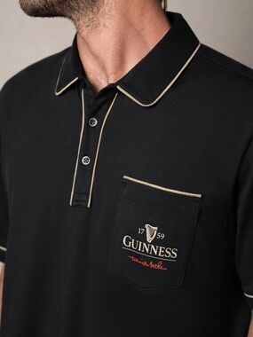 Travis Mathew Guiness Pint Path Black Polo